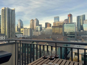 Top Corner 2BR, Stampede & DT Views by Doorbed